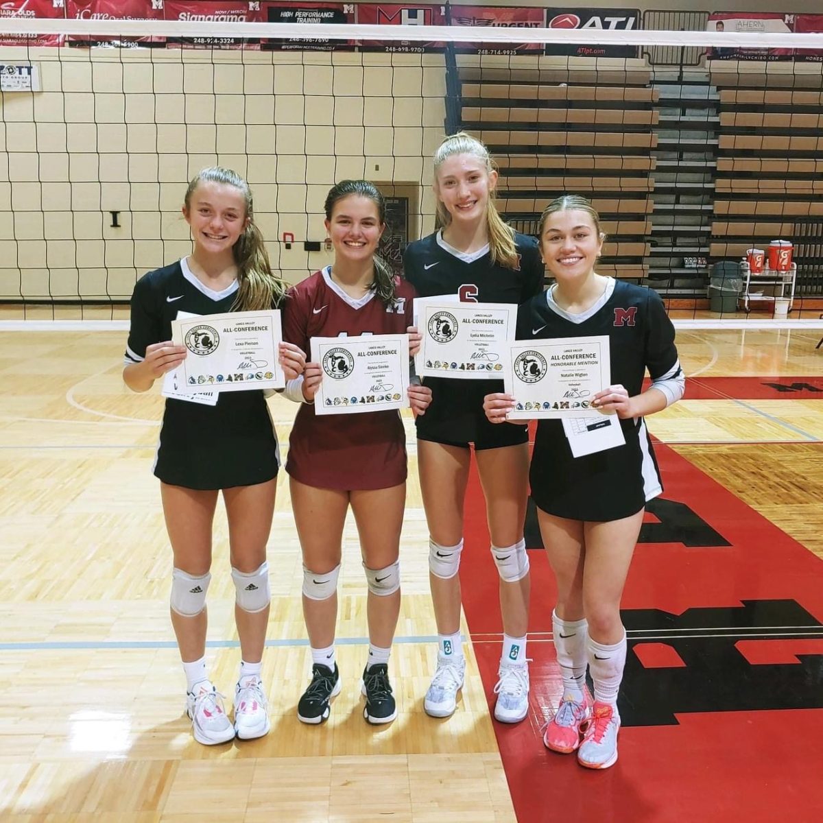 Milford's volleyball seniors with some "Block Party" members.