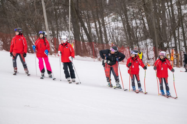 Two skis, two poles and a very, very steep hill: the girl’s ski team